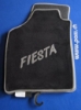 Bild von Ausverkauf Fussmatte Ford Fiesta Jg.3.89-96, -Velour schw./grau mit Schriftzug Fiesta (nur solange Vorrat, vorheriger vk.119.-) *